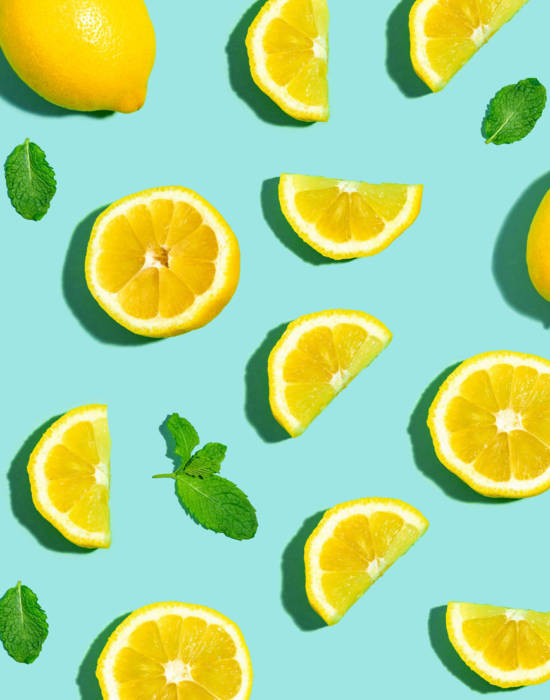 Fresh lemon pattern on a bright color background flat lay