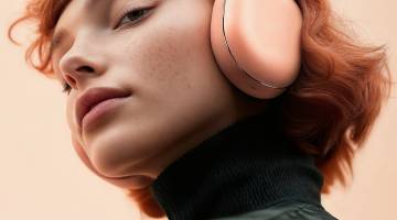 Contemplative Redhead with Headphones