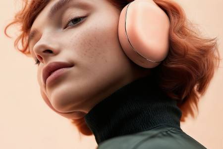 Contemplative Redhead with Headphones